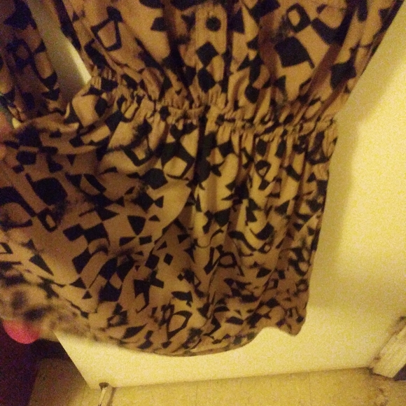 This little cut out mini skirt and backless out fit is perfect for a night out. - Picture 2 of 5